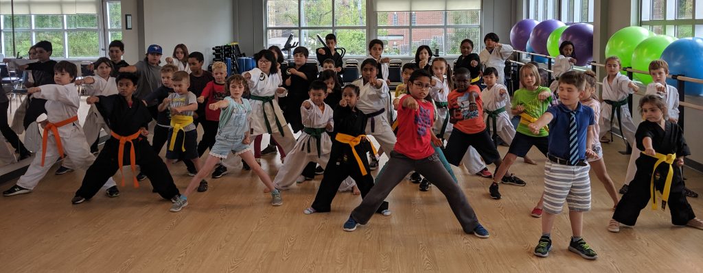 Group of youth in martial arts class